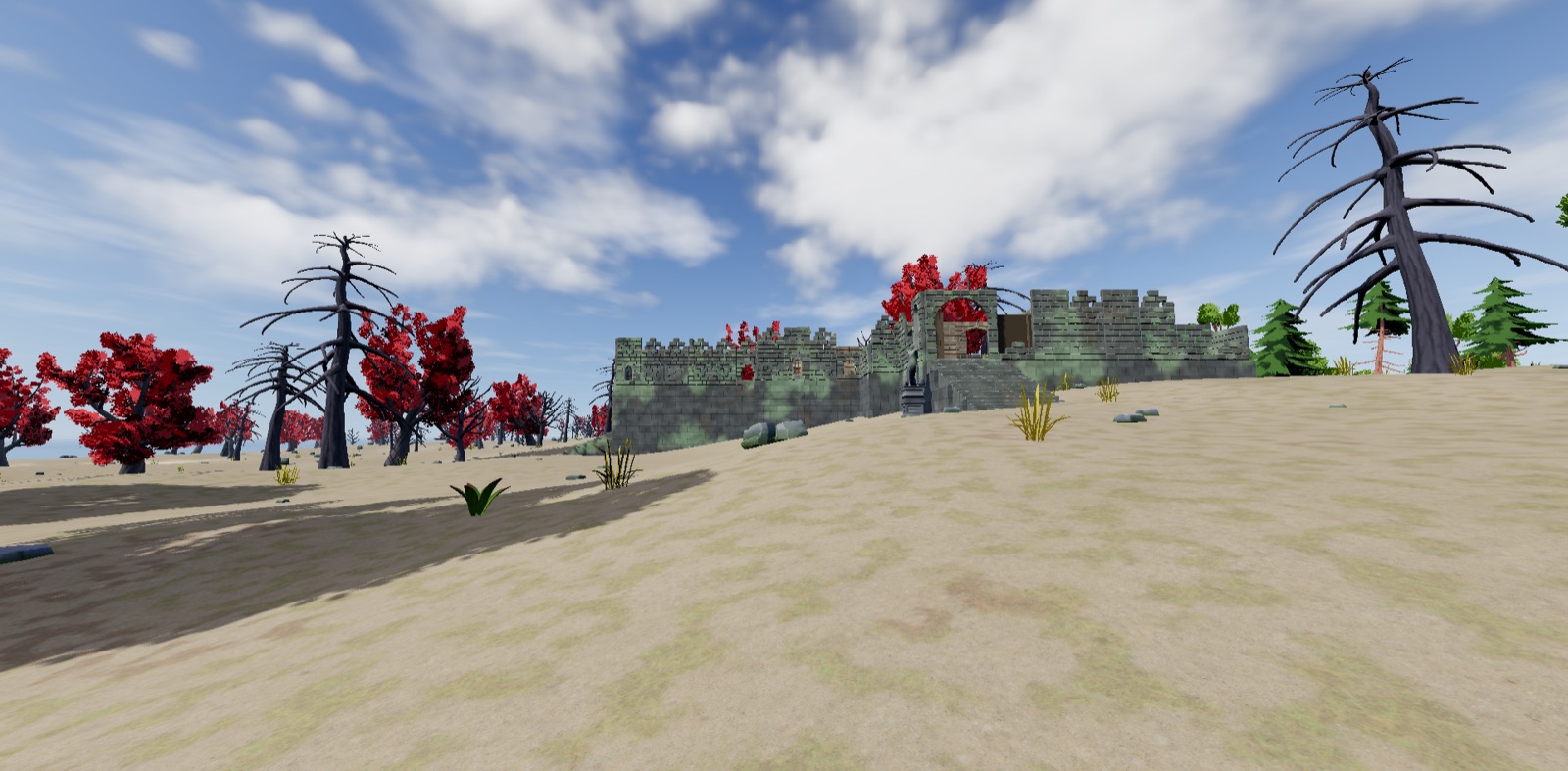 A moss-covered ruined fortress on a sandy rise among bare and crimson trees